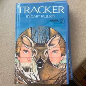 Tracker 4 hard cover books. Gary Paulsen